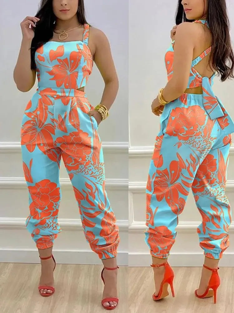 Elevate Your Summer Style with Our Elegant Printed Sleeveless Jumpsuit - Chic Hollow Backless Design with Lace-Up Detail and Convenient Pockets!